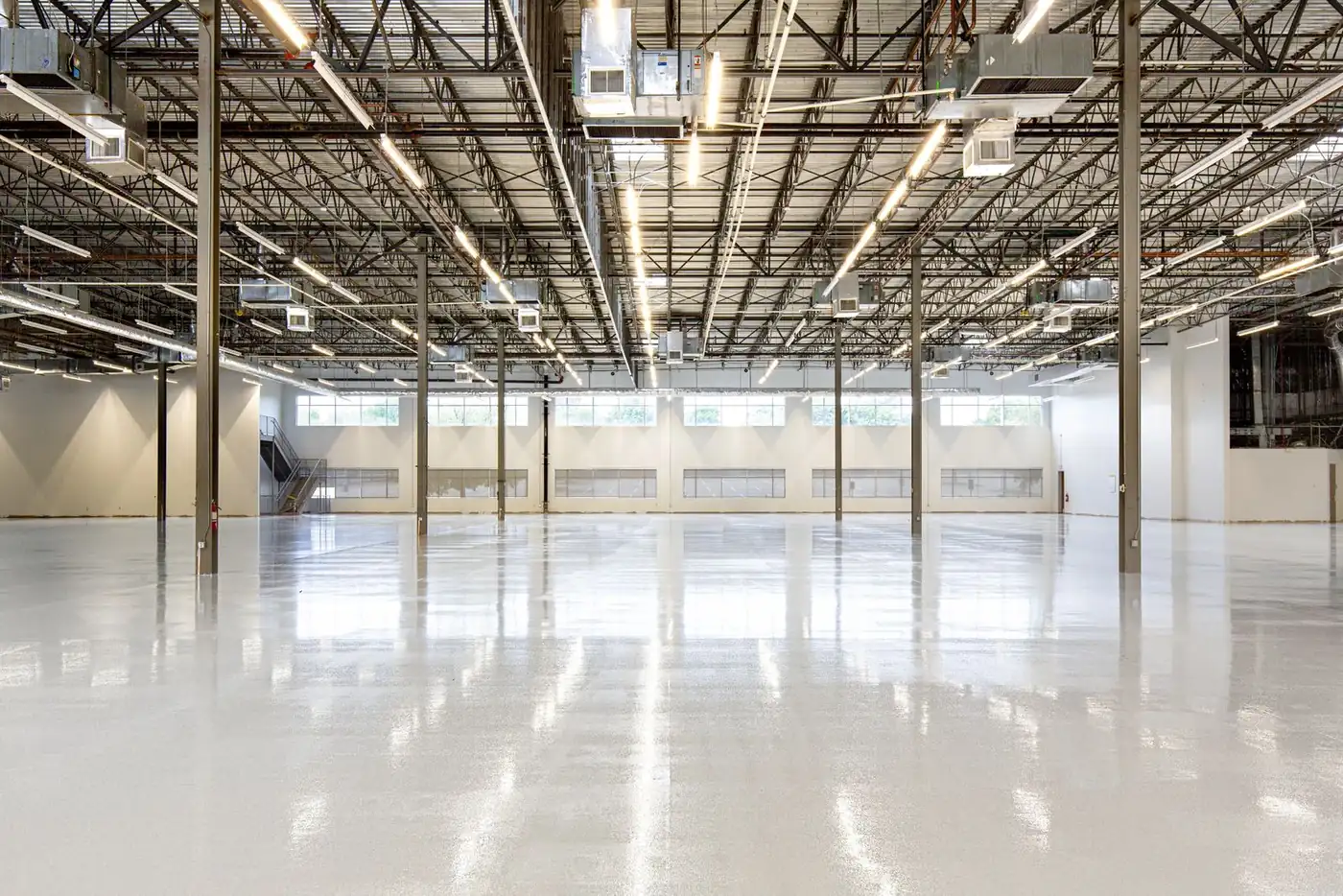 Polished commercial floor in an open warehouse bay